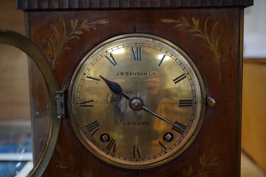 An early 20th century mantel clock, the dial inscribed J W Benson Ltd, London, with pendulum and key, 41cm high. Condition - fair, untested